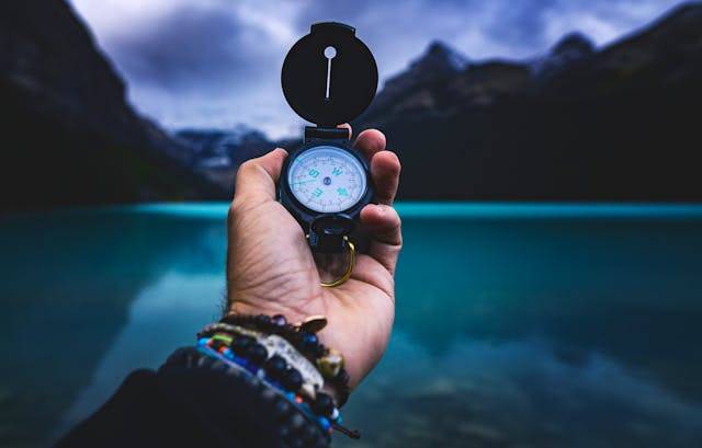 Photo by Joshua Woroniecki: https://www.pexels.com/photo/person-holding-a-compass-3832684/