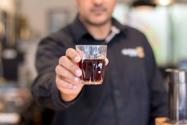 Photo by Di Bella Coffee: https://www.pexels.com/photo/selective-focus-photo-of-man-s-hand-holding-drinking-glass-with-liquid-inside-1233530/