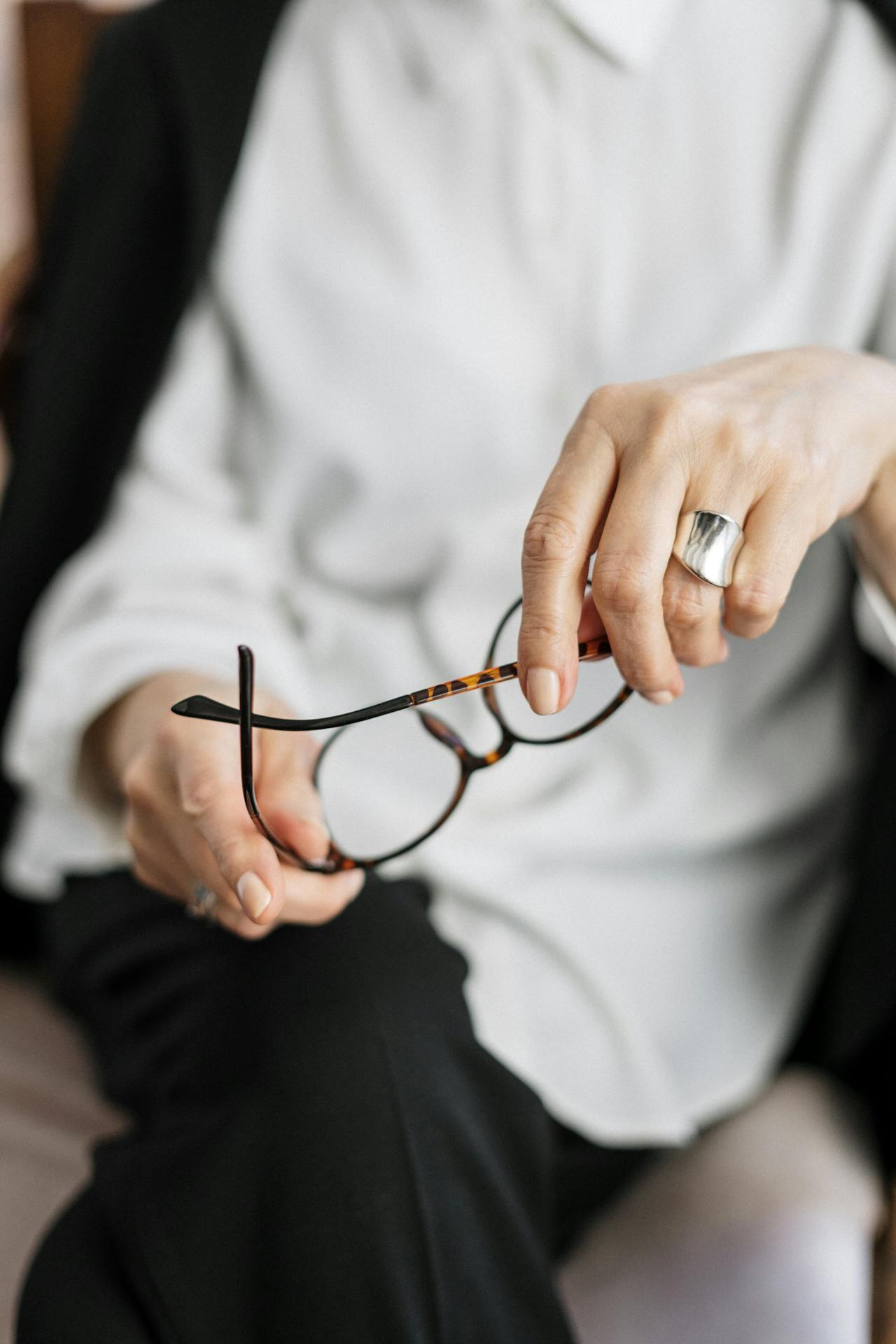 Photo by cottonbro studio: https://www.pexels.com/photo/person-holding-brown-framed-eyeglasses-4098340/